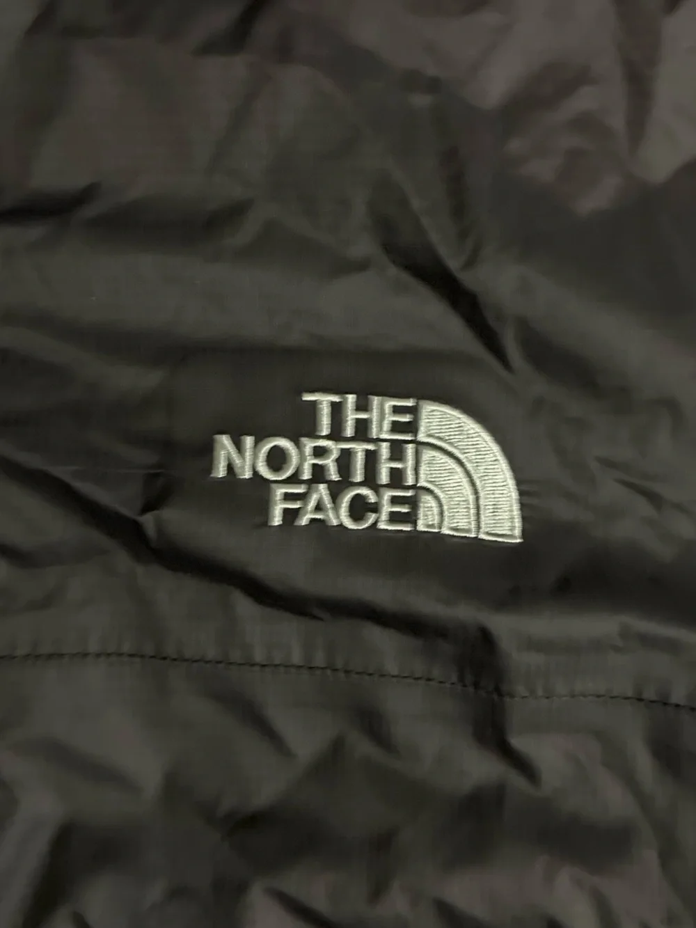 NWT. Brand New The North Face Black Dryvent Waterproof Hooded Jacket.